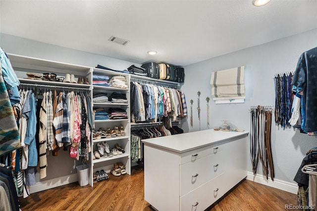3002 S Oak Way, Lakewood, CO 80227 - spacious closet featuring wood finished floors