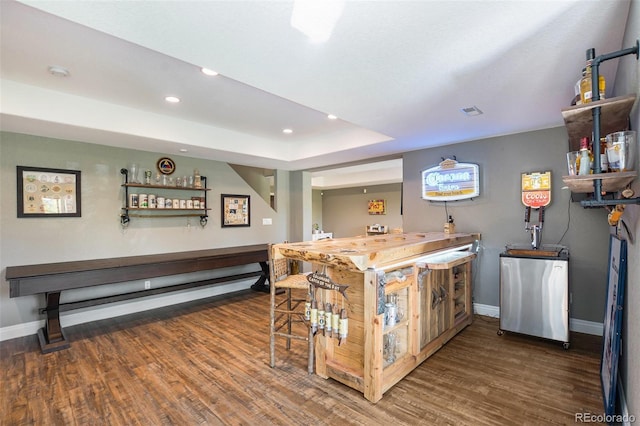 3002 S Oak Way, Lakewood, CO 80227 - indoor bar with baseboards, wood finished floors, recessed lighting, and fridge
