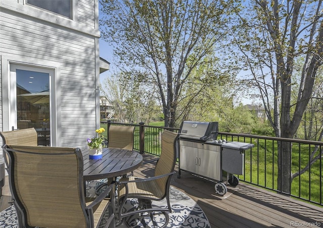 3002 S Oak Way, Lakewood, CO 80227 - deck featuring outdoor dining area