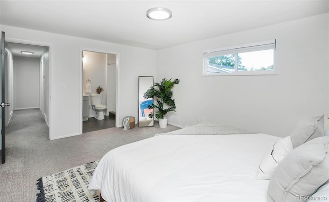 bedroom with carpet flooring and ensuite bathroom