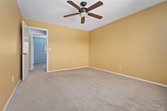 411 S Cody Ct, Lakewood, CO 80226 - spare room with ceiling fan, carpet, a textured ceiling, and baseboards
