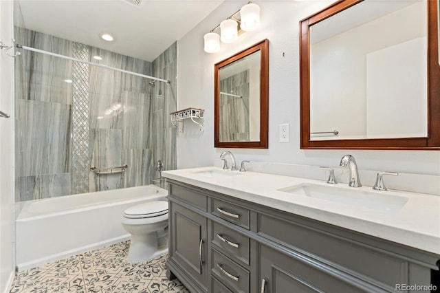 411 S Cody Ct, Lakewood, CO 80226 - full bath with toilet, shower / washtub combination, double vanity, tile patterned flooring, and recessed lighting
