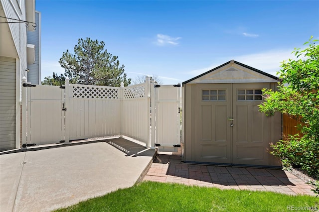 411 S Cody Ct, Lakewood, CO 80226 - view of shed featuring a gate and fence