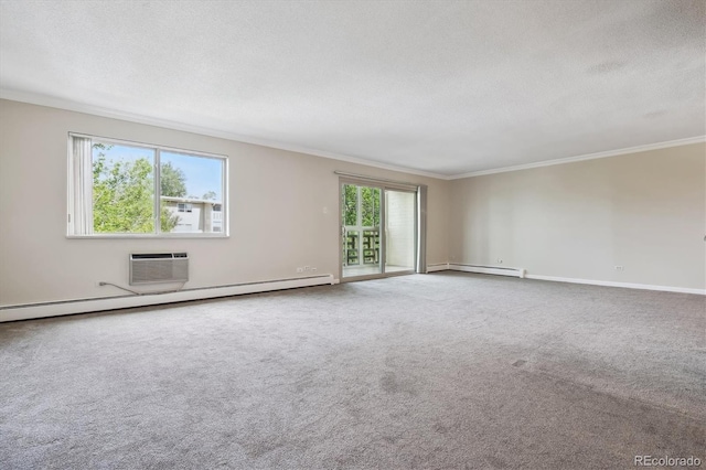 spare room featuring a baseboard radiator, a wealth of natural light, and ornamental molding