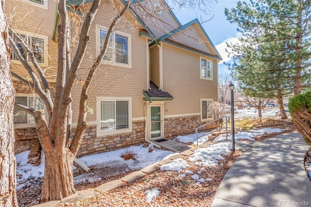 view of front of home featuring stone siding