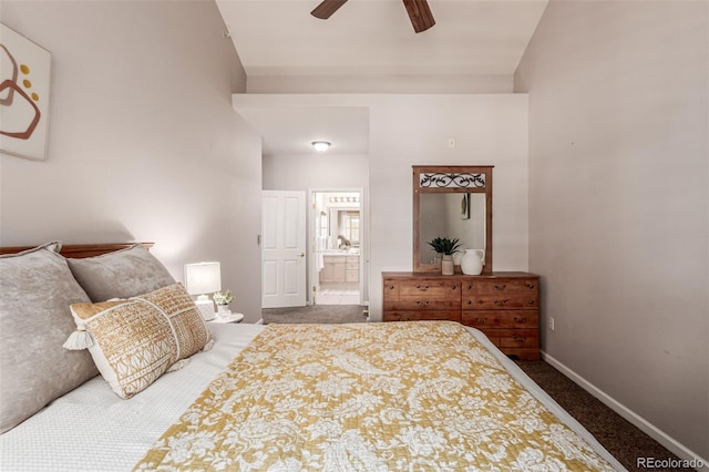 bedroom featuring carpet floors, ceiling fan, ensuite bath, and baseboards