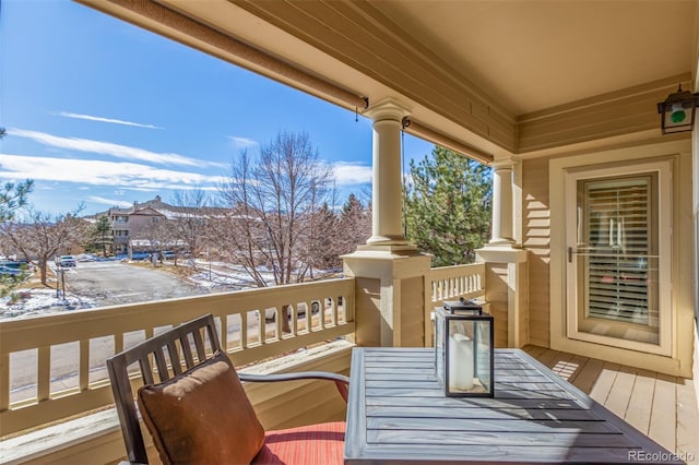 view of snow covered deck