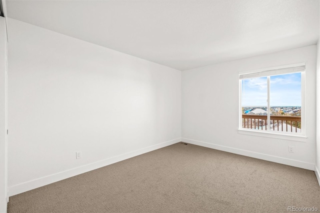 view of carpeted spare room