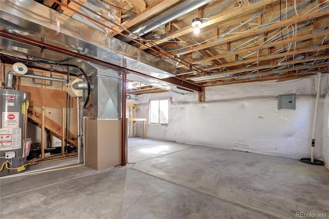 basement featuring water heater, heating unit, and electric panel