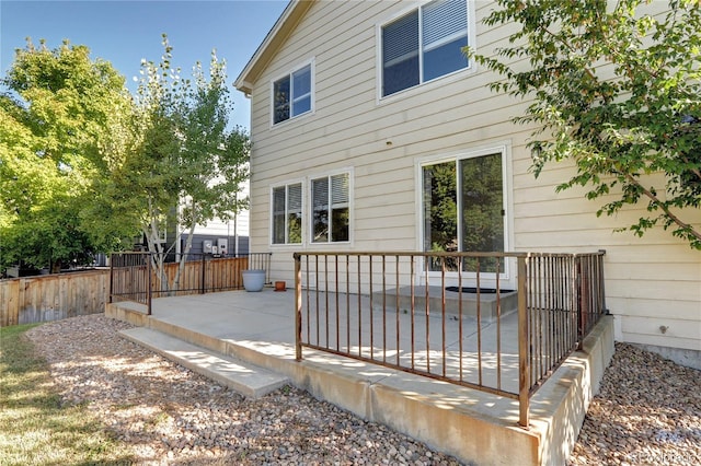 rear view of house featuring a patio