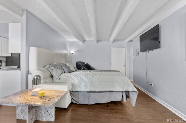 bedroom with dark wood-style flooring and baseboards
