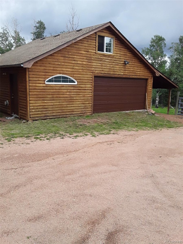 exterior space with a garage