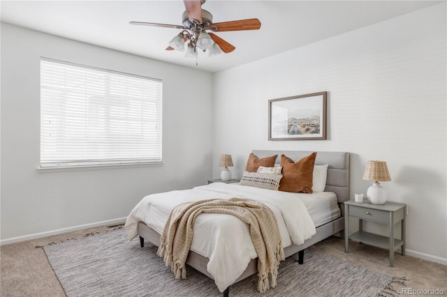 bedroom featuring ceiling fan and carpet floors