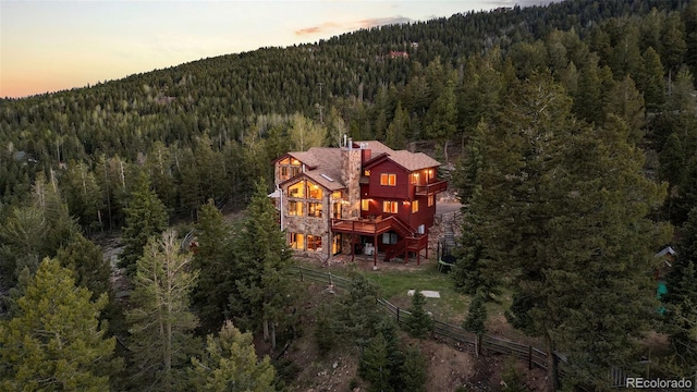 30717 Conifer Mountain Dr, Conifer, CO 80433 - aerial view at dusk of a wooded view