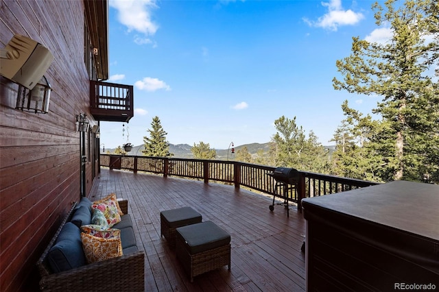 30717 Conifer Mountain Dr, Conifer, CO 80433 - wooden deck with a mountain view, a hot tub, and grilling area