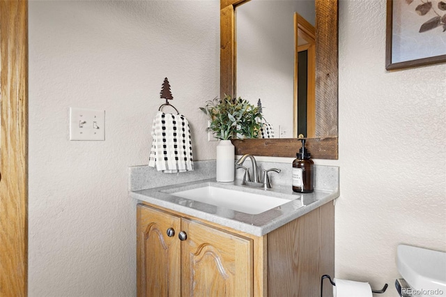 30717 Conifer Mountain Dr, Conifer, CO 80433 - half bath with vanity and a textured wall