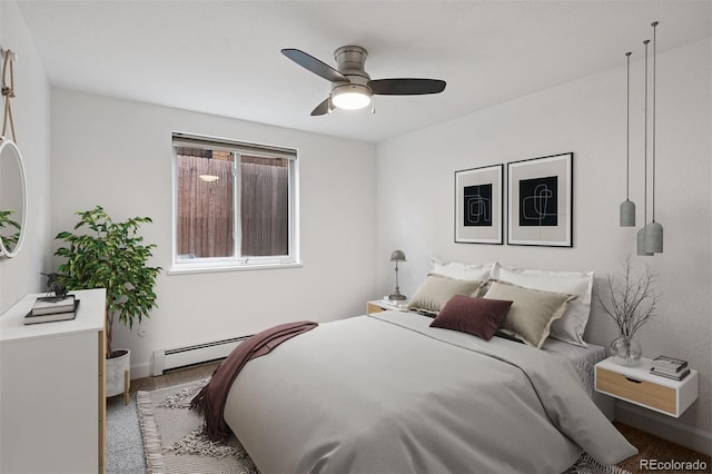 1 N Pearl St Unit 102, Denver, CO 80203 - bedroom with a baseboard heating unit, baseboards, ceiling fan, and carpet floors