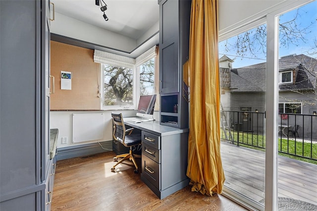 home office featuring wood finished floors
