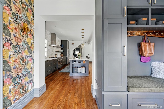 hallway with wood finished floors