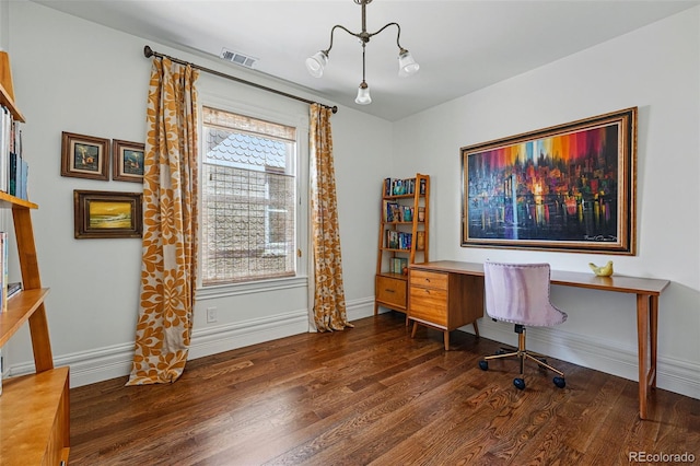 home office with wood finished floors and baseboards
