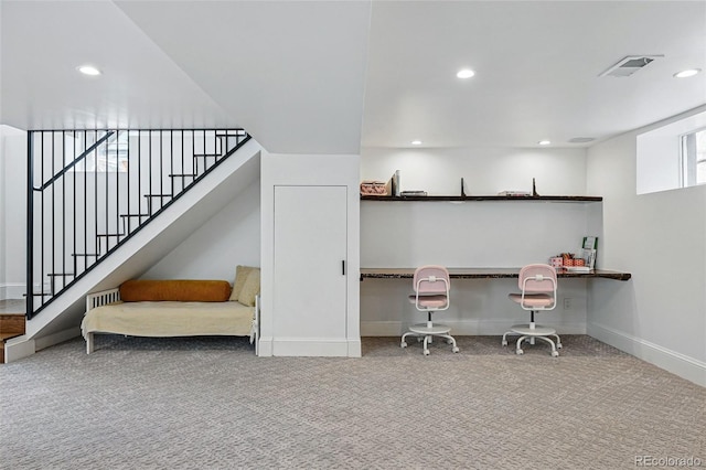 interior space featuring carpet, baseboards, recessed lighting, and stairway