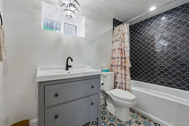 bathroom featuring toilet, vanity, and shower / tub combo with curtain