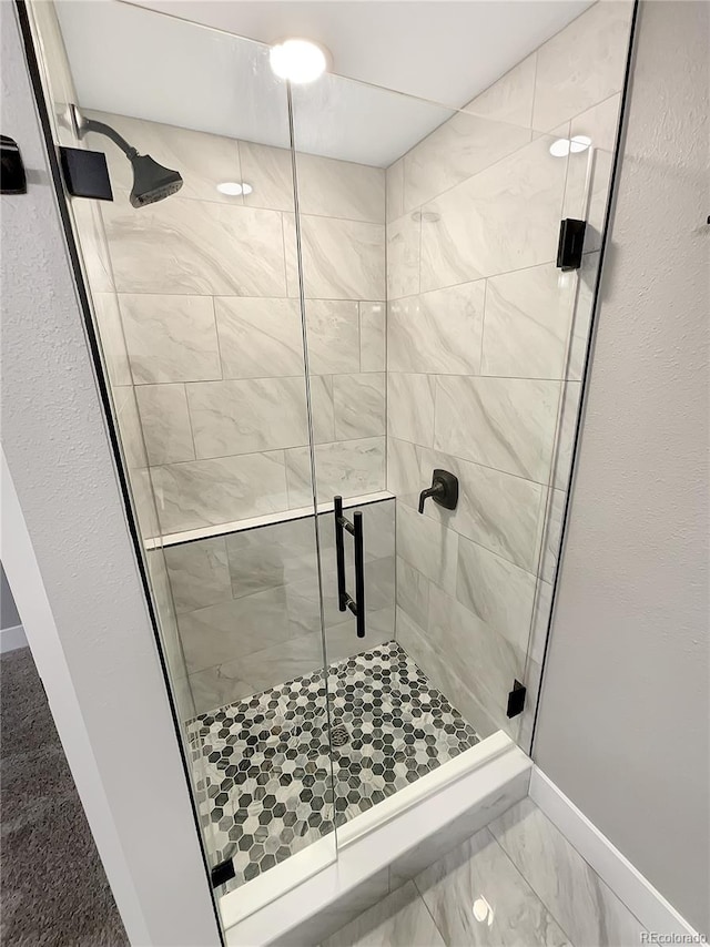 bathroom featuring walk in shower