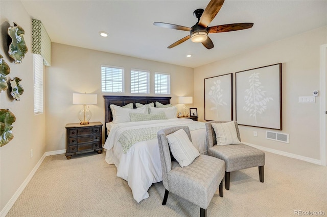 carpeted bedroom with ceiling fan