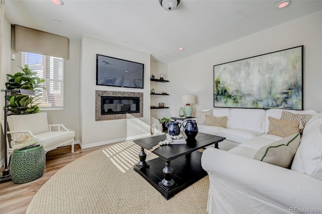 living room with light hardwood / wood-style floors