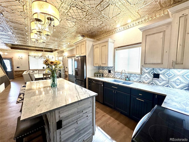 10704 Engelmann Ave, Salida, CO 81201 - kitchen with a sink, dishwashing machine, an ornate ceiling, a chandelier, and stainless steel refrigerator with ice dispenser