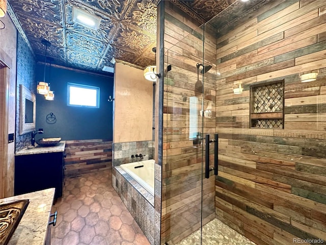 10704 Engelmann Ave, Salida, CO 81201 - full bath with vanity, wood walls, an ornate ceiling, a shower stall, and a bath