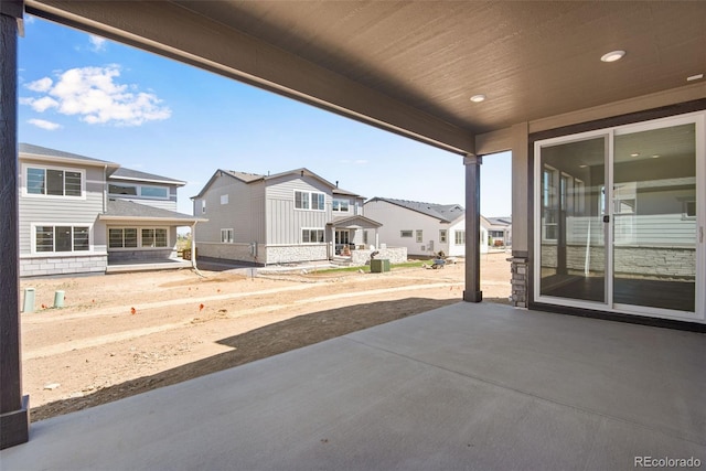 24563 E 34th Ave, Aurora, CO 80019 - view of patio / terrace with a residential view and central AC