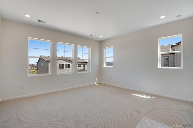 24563 E 34th Ave, Aurora, CO 80019 - spare room with baseboards, light colored carpet, and recessed lighting