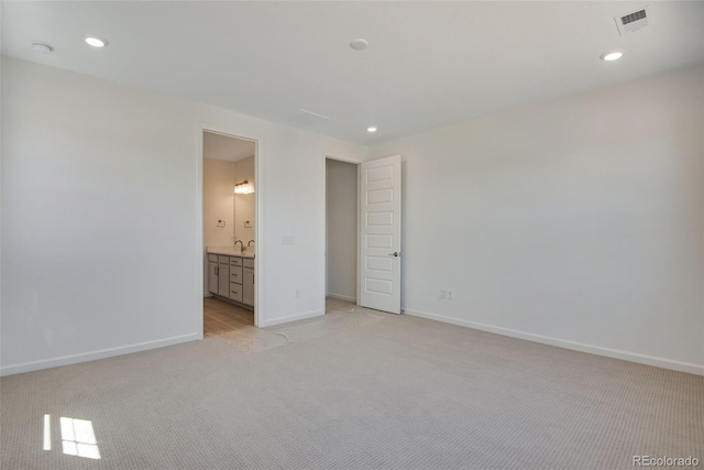 24563 E 34th Ave, Aurora, CO 80019 - unfurnished bedroom with light carpet, recessed lighting, baseboards, and ensuite bath