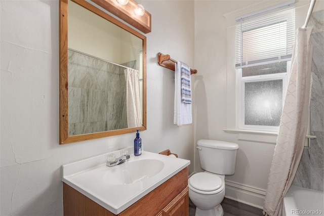 full bathroom featuring vanity, toilet, and shower / bath combo