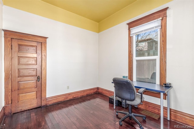 219 Terry St, Longmont, CO 80501 - home office with dark wood-style flooring and baseboards