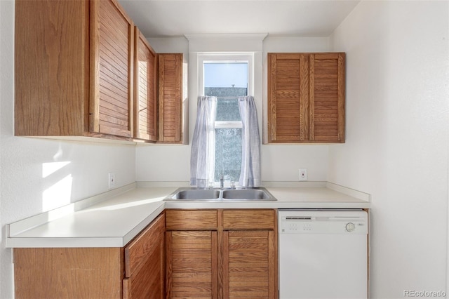 219 Terry St, Longmont, CO 80501 - kitchen with dishwasher, a sink, light countertops, and brown cabinetry