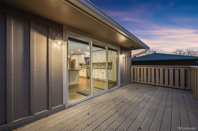 view of deck at dusk