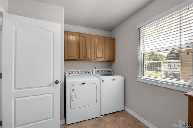 10643 Black Kettle Way, Colorado Springs, CO 80908 - laundry room featuring cabinet space, separate washer and dryer, and healthy amount of natural light