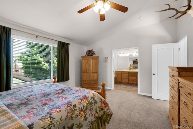 10643 Black Kettle Way, Colorado Springs, CO 80908 - bedroom with vaulted ceiling, light carpet, ceiling fan, and ensuite bath