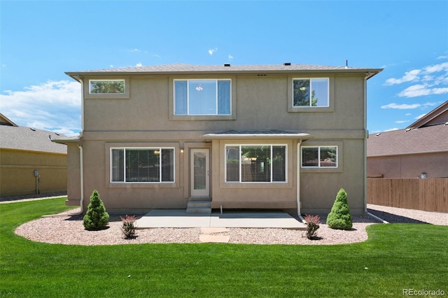 10643 Black Kettle Way, Colorado Springs, CO 80908 - back of property with a patio, stucco siding, and entry steps