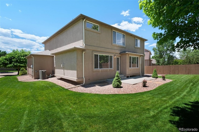 10643 Black Kettle Way, Colorado Springs, CO 80908 - rear view of house with a patio and stucco siding
