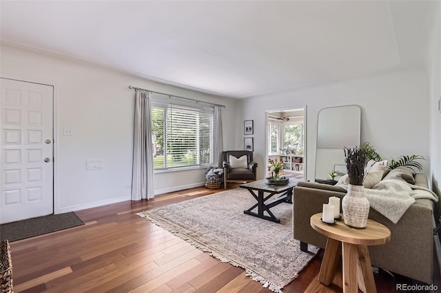 1697 W Powers Ave, Littleton, CO 80120 - living area featuring wood finished floors and baseboards