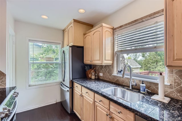 1697 W Powers Ave, Littleton, CO 80120 - kitchen featuring light brown cabinets, a sink, appliances with stainless steel finishes, dark wood-style flooring, and recessed lighting