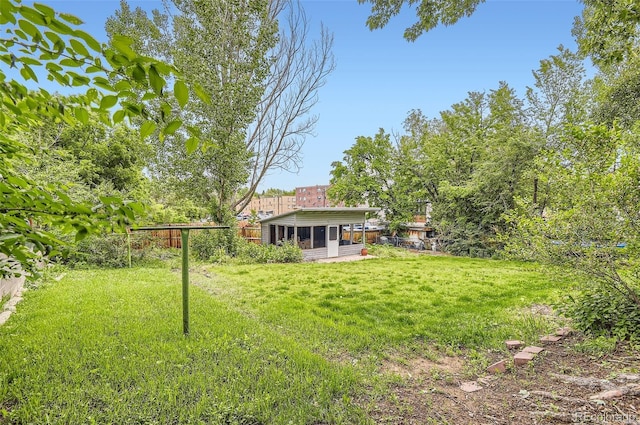 1697 W Powers Ave, Littleton, CO 80120 - view of yard featuring a sunroom