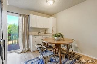 dining room with light hardwood / wood-style floors