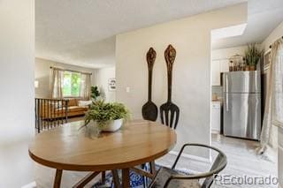 dining room featuring light wood-type flooring