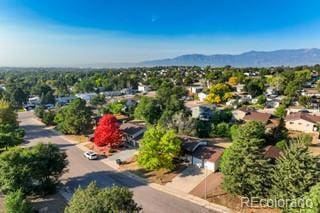 birds eye view of property with a mountain view