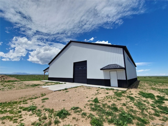 view of outbuilding featuring a garage