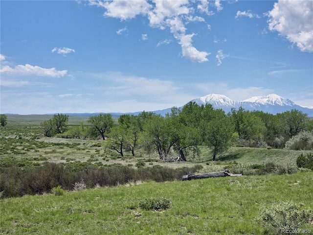 view of mountain feature featuring a rural view